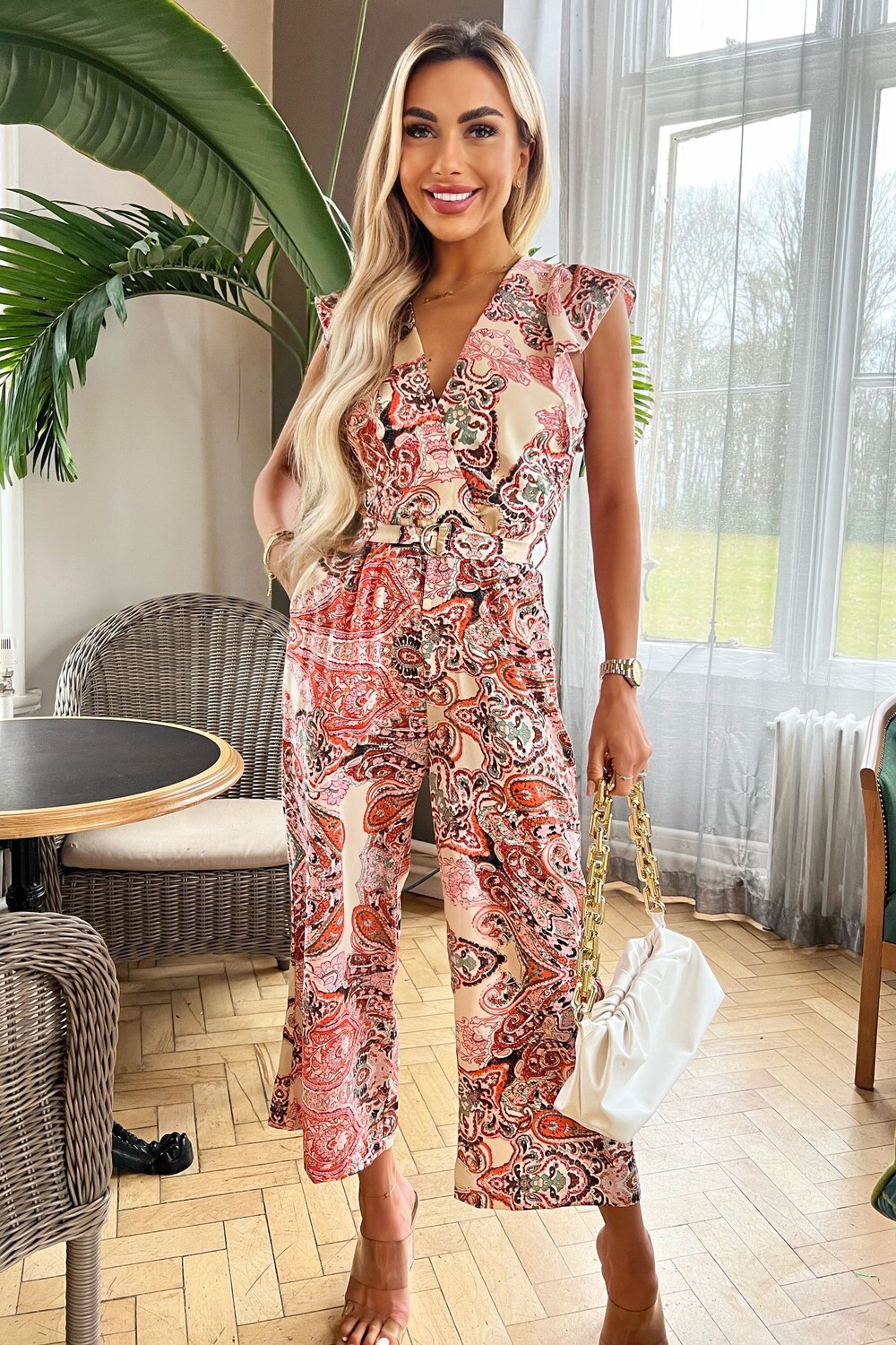 Комбинезон с короткими рукавами, поясом и многоцветным принтом Ax Paris, розовый
Комбинезон с короткими рукавами, поясом и многоцветным принтом Ax Paris, розовый