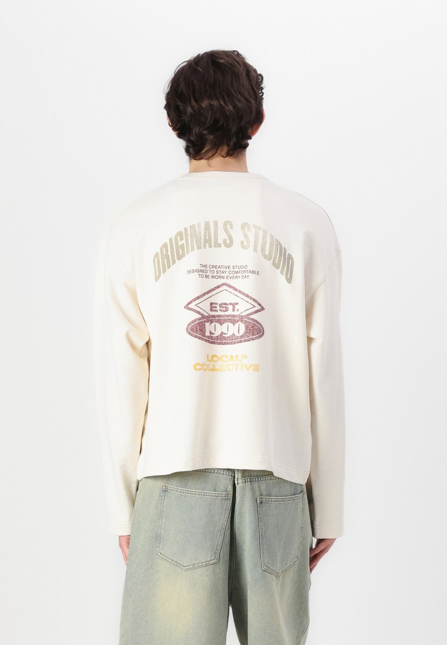 Толстовка Jack & Jones RRETIRO BACK CREW NECK, Ecru/Off-White
Толстовка Jack & Jones RRETIRO BACK CREW NECK, Ecru/Off-White