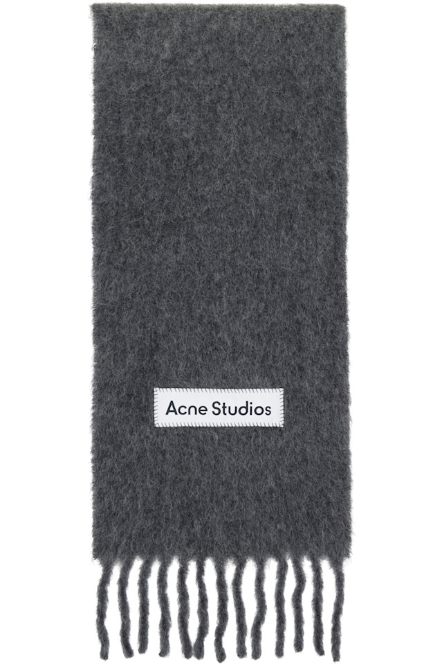 Acne Studios Серый шерстяной шарф с бахромой
Acne Studios Серый шерстяной шарф с бахромой