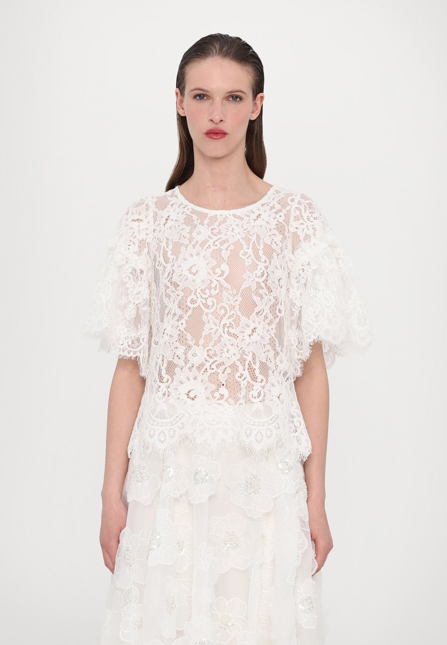 Блуза Ida Sjöstedt MAGGIE , Ivory/Off-White
Блуза Ida Sjöstedt MAGGIE , Ivory/Off-White