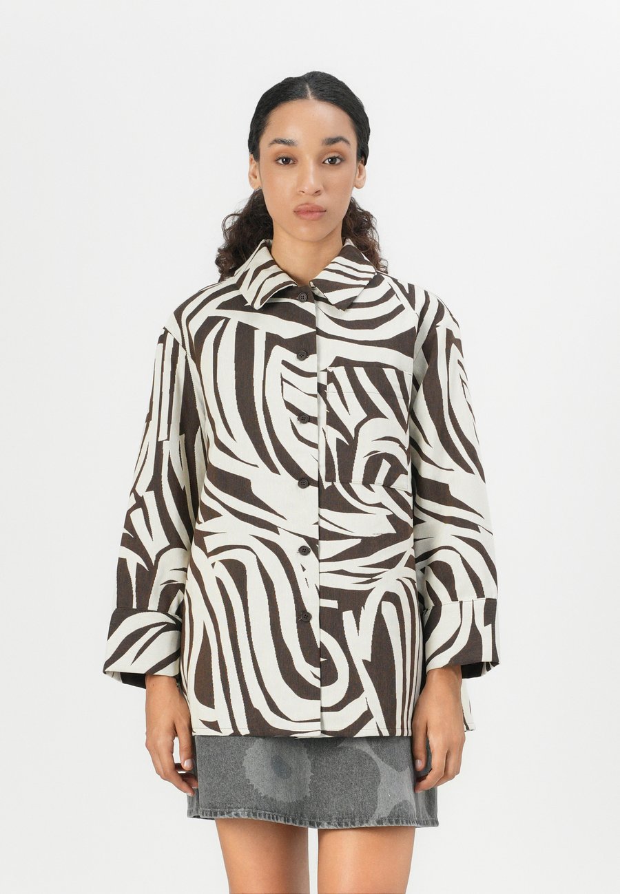 Блуза Marimekko RAKENNE JOKURAITA, Light Beige/Dark Brown/Brown
Блуза Marimekko RAKENNE JOKURAITA, Light Beige/Dark Brown/Brown