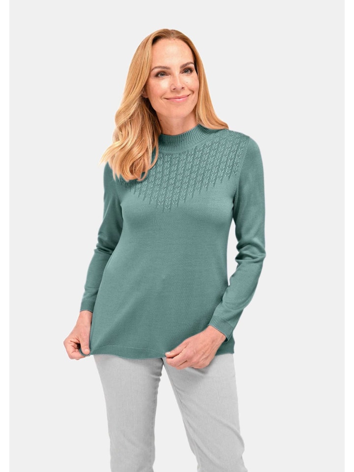 Короткий размер: Вязаный свитер Элегантный ажурный свитер с воротником-стойкой в серо-зеленом цвете. GOLDNER
Короткий размер: Вязаный свитер Элегантный ажурный свитер с воротником-стойкой в серо-зеленом цвете. GOLDNER
