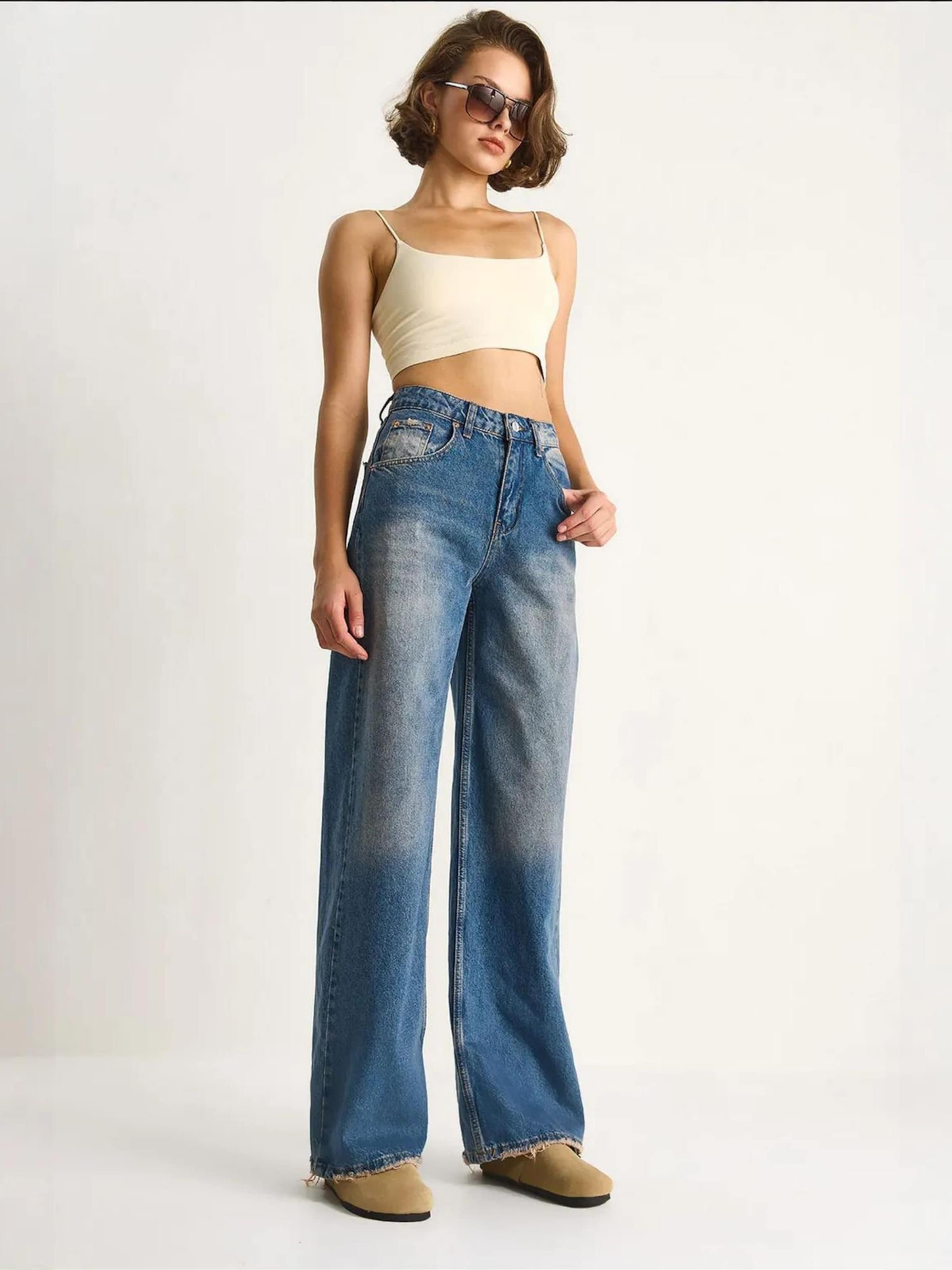 Bianco Lucci Джинсы свободного кроя в синем цвете
Bianco Lucci Джинсы свободного кроя в синем цвете