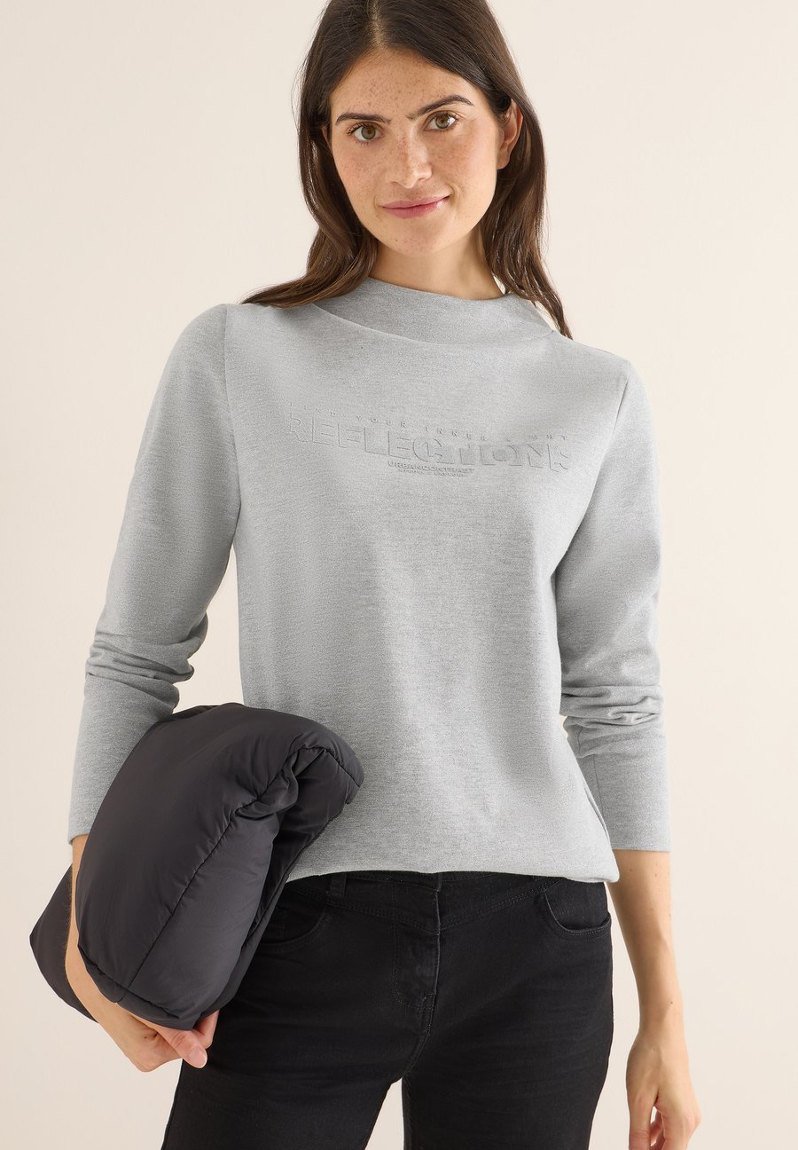 Топ Cecil Long sleeved top, Grau/Mottled Light Grey
Топ Cecil Long sleeved top, Grau/Mottled Light Grey