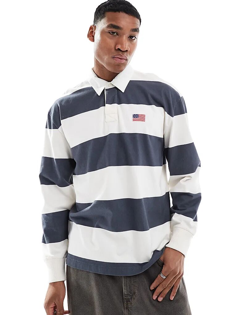 Футболка для регби с контрастными полосками и логотипом университета в темно-синем цвете Hollister
Футболка для регби с контрастными полосками и логотипом университета в темно-синем цвете Hollister