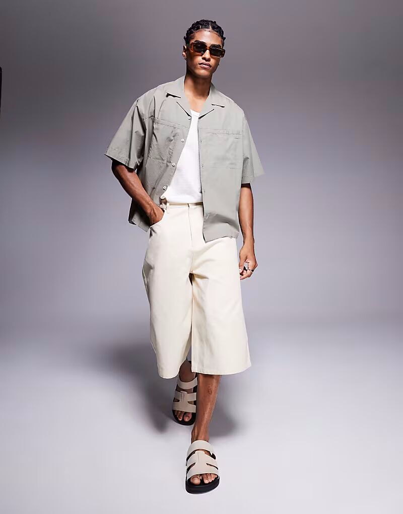 Рубашка свободного кроя ASOS DESIGN цвета хаки со скрытыми карманами
Рубашка свободного кроя ASOS DESIGN цвета хаки со скрытыми карманами