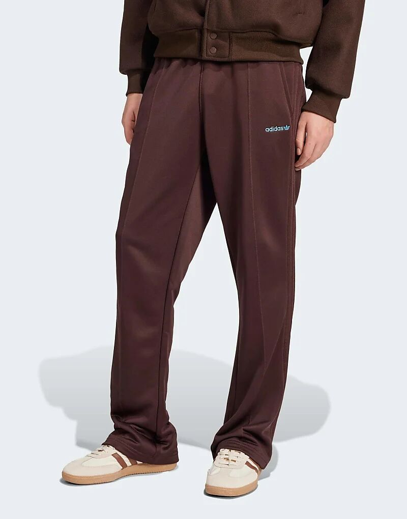 Брюки-клеш коричневого цвета adidas Originals
Брюки-клеш коричневого цвета adidas Originals