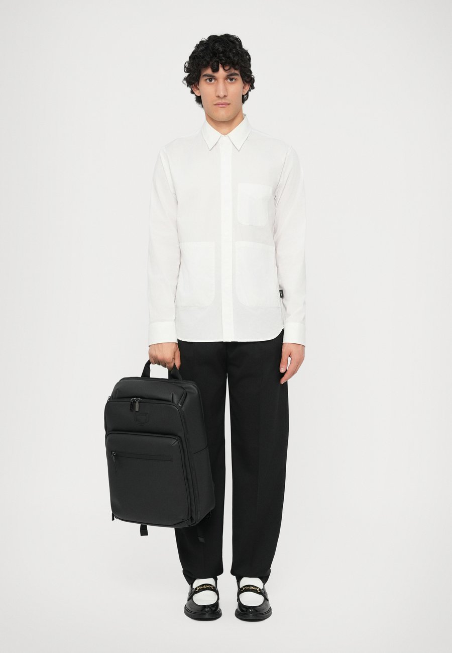 Рюкзак Lancel RUBBER CONVERT UNISEX, Black
Рюкзак Lancel RUBBER CONVERT UNISEX, Black