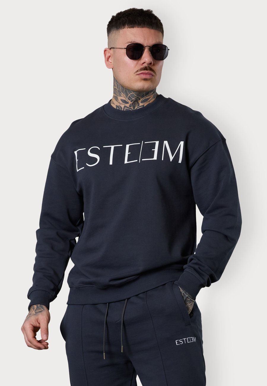 Толстовка ESTEEM LETTERING 3.0, Woodland/Anthracite
Толстовка ESTEEM LETTERING 3.0, Woodland/Anthracite