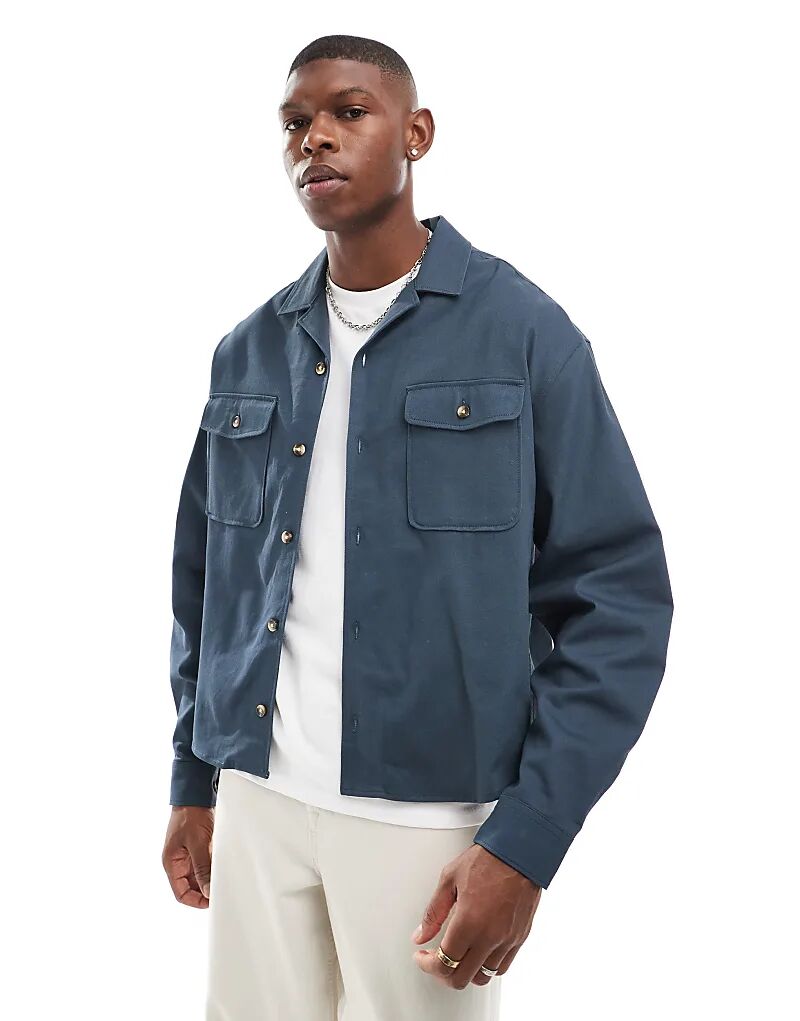 Куртка-рубашка свободного кроя из хлопка ASOS DESIGN темно-синего цвета с воротником-лацканами
Куртка-рубашка свободного кроя из хлопка ASOS DESIGN темно-синего цвета с воротником-лацканами
