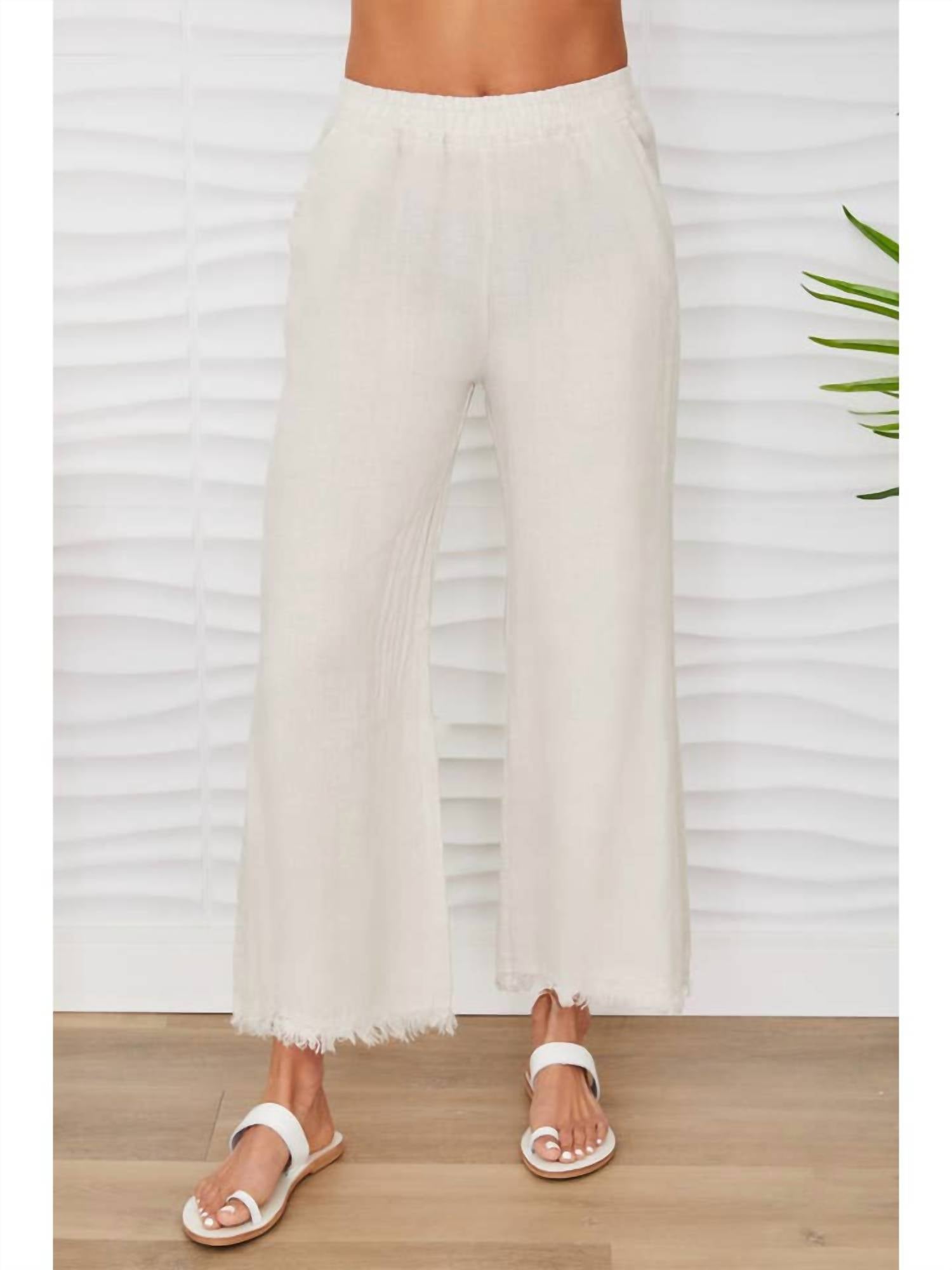 Льняные брюки с бахромой на подоле в бежевом цвете Milio Milano
Льняные брюки с бахромой на подоле в бежевом цвете Milio Milano
