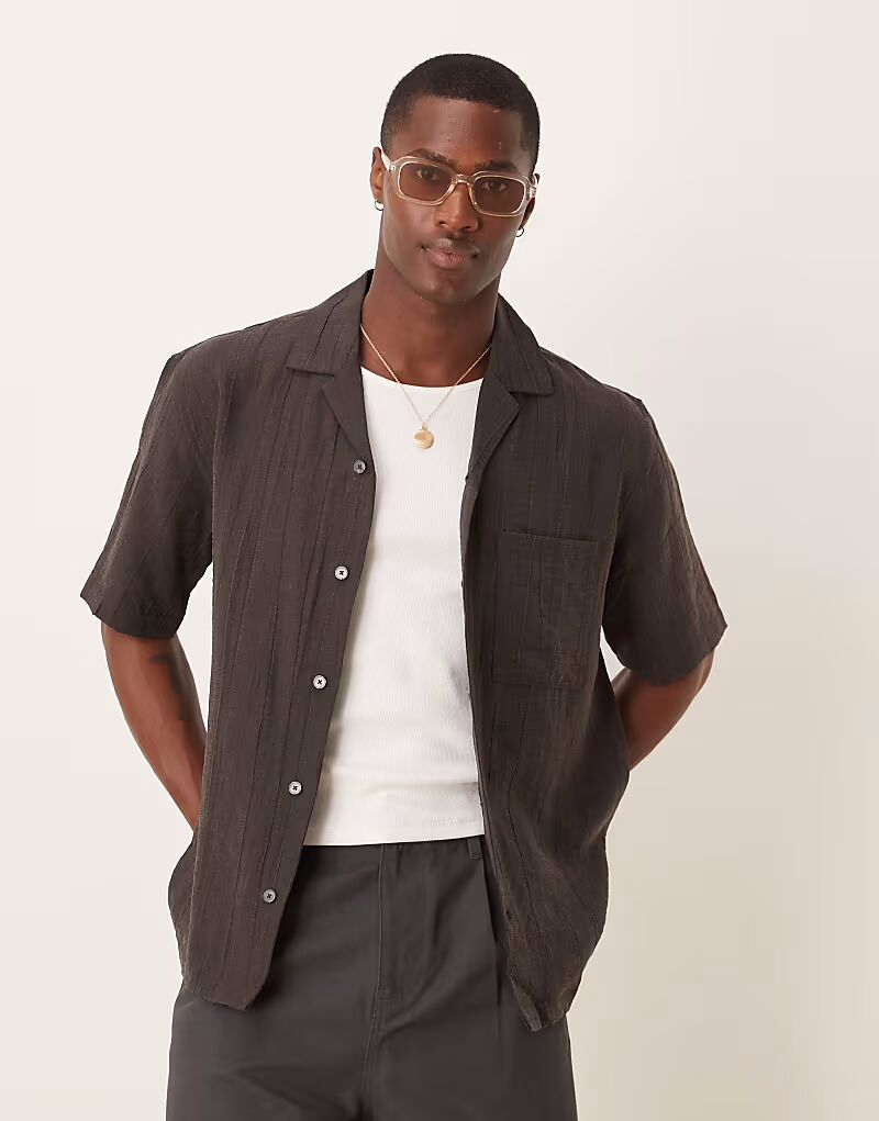 Рубашка с короткими рукавами из хлопка свободного кроя Mango шоколадного цвета
Рубашка с короткими рукавами из хлопка свободного кроя Mango шоколадного цвета