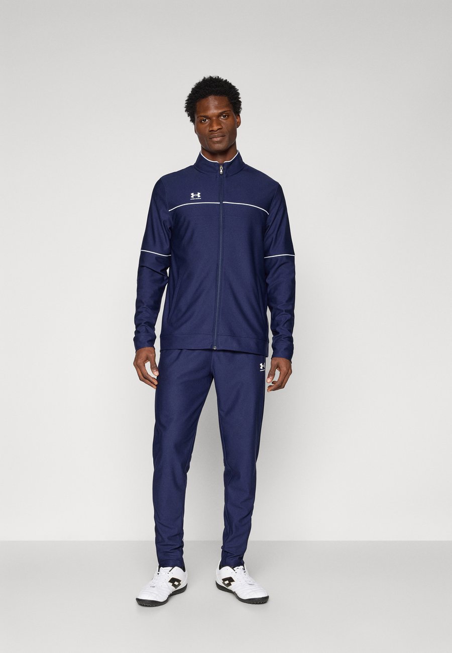 Спортивный костюм Under Armour CHALLENGER, Midnight Navy/White/Dark Blue
Спортивный костюм Under Armour CHALLENGER, Midnight Navy/White/Dark Blue