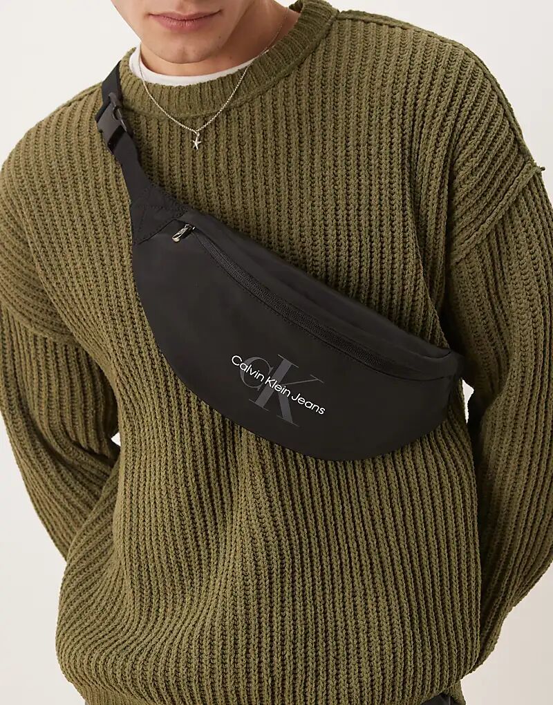 Поясная сумка с логотипом Calvin Klein Jeans черного цвета
Поясная сумка с логотипом Calvin Klein Jeans черного цвета