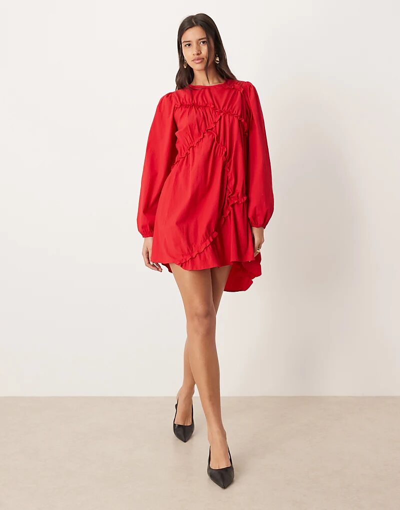 Мини-платье Ghospell Caro из текстурированной хлопковой смеси с асимметричными рюшами красного цвета
Мини-платье Ghospell Caro из текстурированной хлопковой смеси с асимметричными рюшами красного цвета