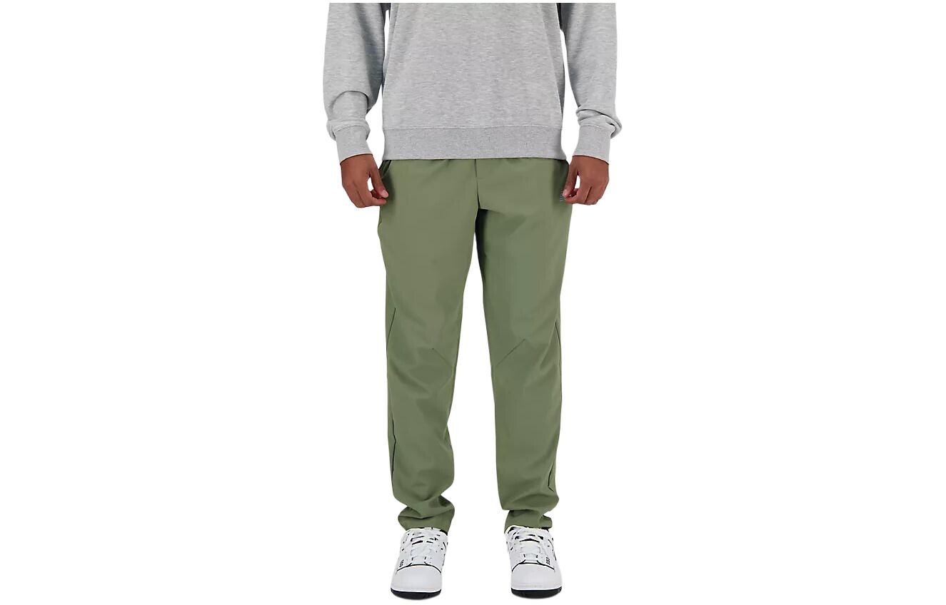 Повседневные брюки мужские зеленые New Balance, зеленый 
Повседневные брюки мужские зеленые New Balance, зеленый