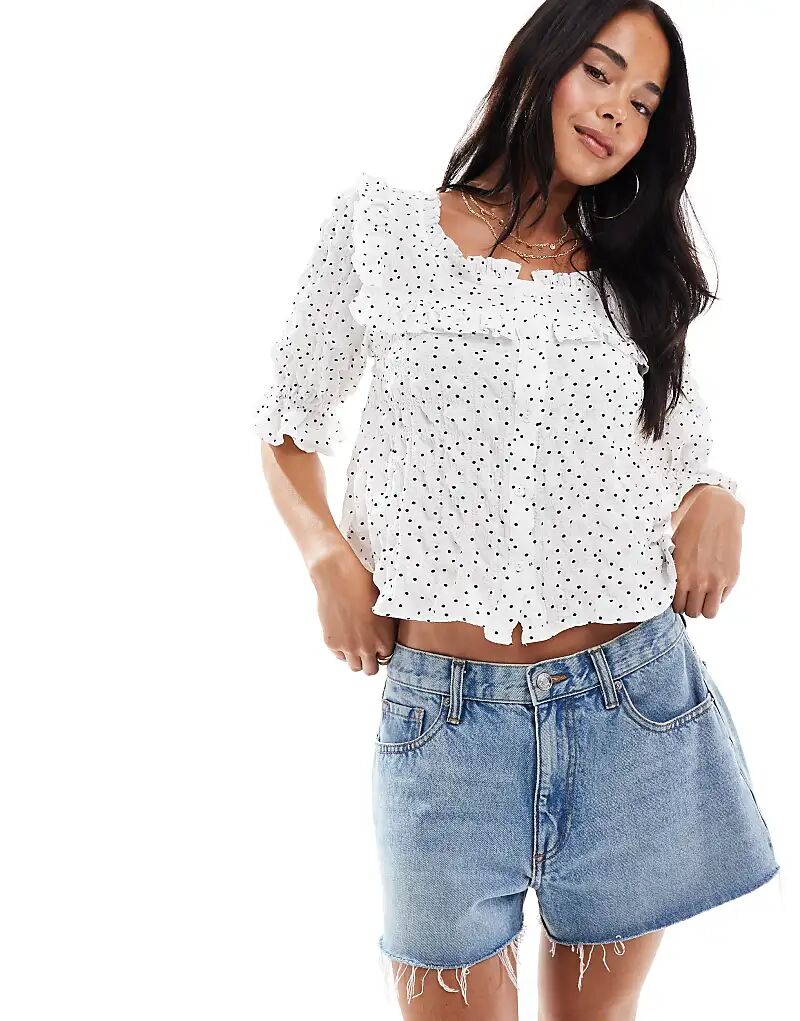 Блузка Miss Selfridge с пуговицами и оборкой в горошек
Блузка Miss Selfridge с пуговицами и оборкой в горошек