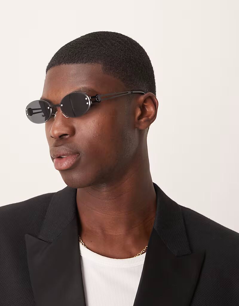 Солнцезащитные очки без оправы ASOS DESIGN festival овальной формы с дымчатыми линзами и черной металлической оправой
Солнцезащитные очки без оправы ASOS DESIGN festival овальной формы с дымчатыми линзами и черной металлической оправой