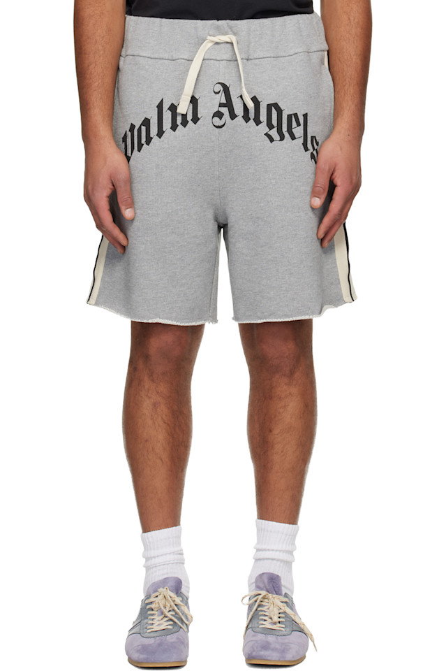 Palm Angels Серые спортивные шорты с изогнутым логотипом
Palm Angels Серые спортивные шорты с изогнутым логотипом
