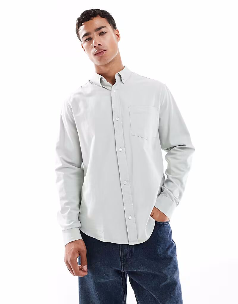 Рубашка оксфорд обычного кроя ASOS DESIGN в цвете шалфейно-зеленый 
Рубашка оксфорд обычного кроя ASOS DESIGN в цвете шалфейно-зеленый