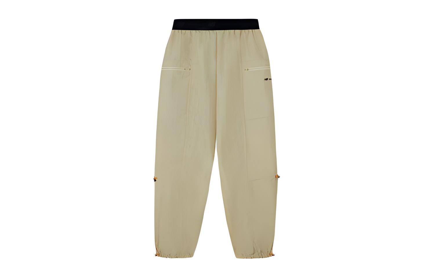 New Balance Спортивные штаны женские экрю
New Balance Спортивные штаны женские экрю