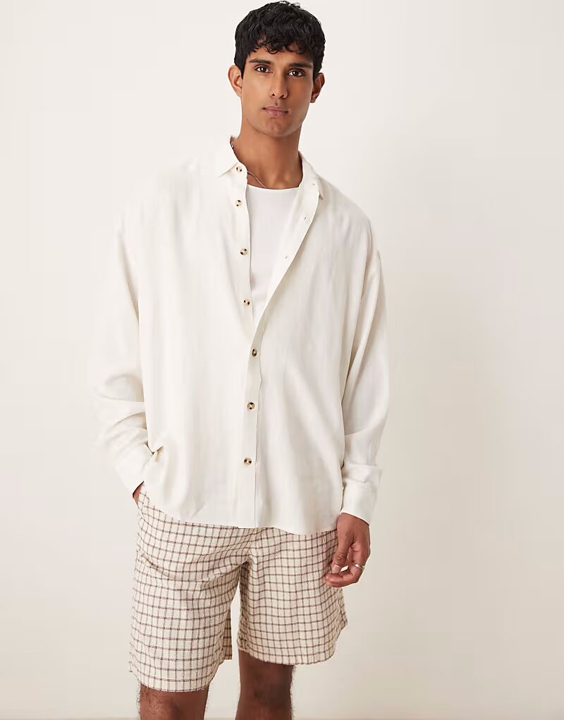 Рубашка свободного кроя ASOS DESIGN из льняной смеси белого цвета 
Рубашка свободного кроя ASOS DESIGN из льняной смеси белого цвета