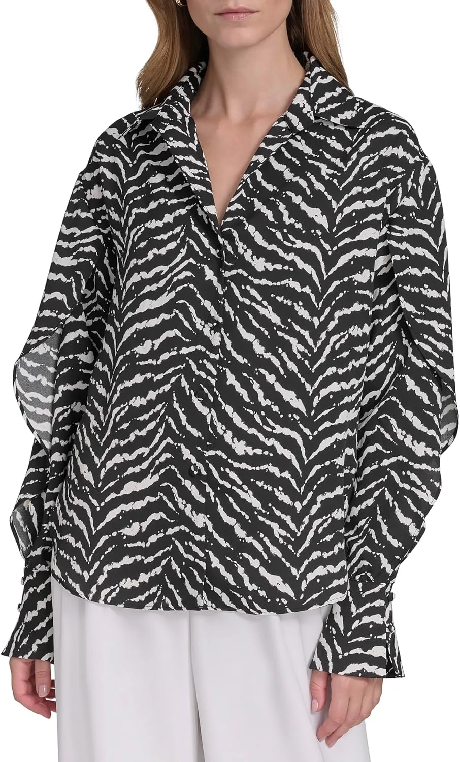 Блузка Halston с рукавами-фонариками и принтом зебра
Блузка Halston с рукавами-фонариками и принтом зебра