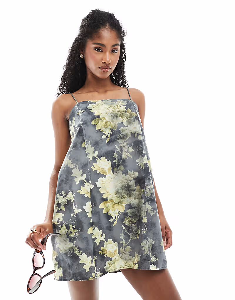 Мини-платье Monki из хлопкового поплина с завязками и желтым принтом
Мини-платье Monki из хлопкового поплина с завязками и желтым принтом