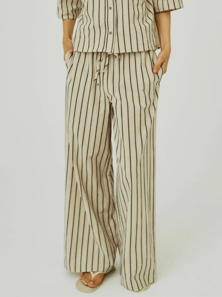 Брюки Arka в черную полоску Norr
Брюки Arka в черную полоску Norr