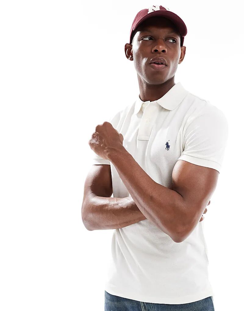 Поло Polo Ralph Lauren с логотипом и принтом в виде пике облегающего кроя кремового цвета
Поло Polo Ralph Lauren с логотипом и принтом в виде пике облегающего кроя кремового цвета