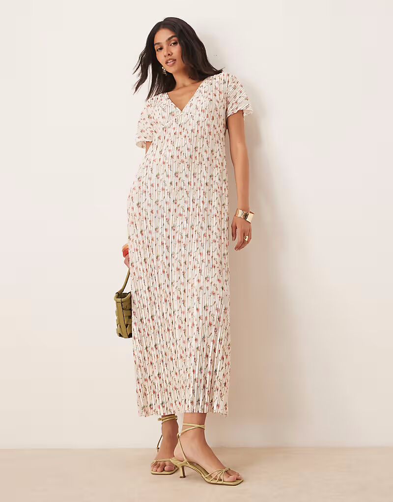 Платье миди ASOS DESIGN с V-образным вырезом и мелким принтом
Платье миди ASOS DESIGN с V-образным вырезом и мелким принтом