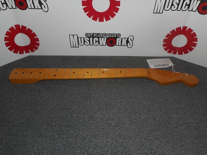 Allparts Fender Licensed Strat Neck, Nitro, Vee Shaping, Maple - #SMNF-V 
Allparts Fender Licensed Strat Neck, Nitro, Vee Shaping, Maple - #SMNF-V