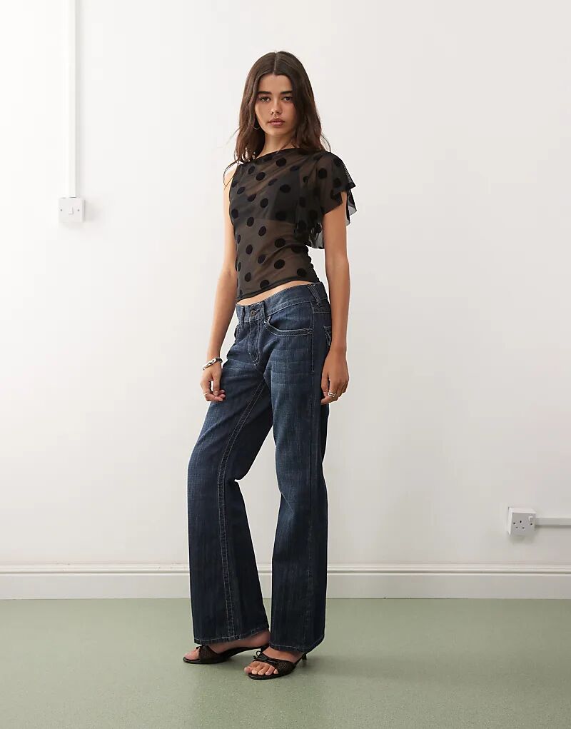 Топ-сетка COLLUSION с одним рукавом в черный горошек
Топ-сетка COLLUSION с одним рукавом в черный горошек