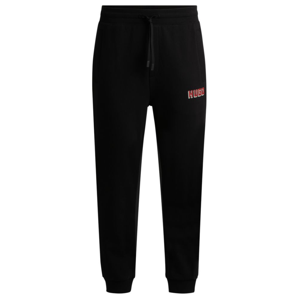 Спортивные брюки из хлопчатобумажной махры с логотипом HUGO, черный
Спортивные брюки из хлопчатобумажной махры с логотипом HUGO, черный