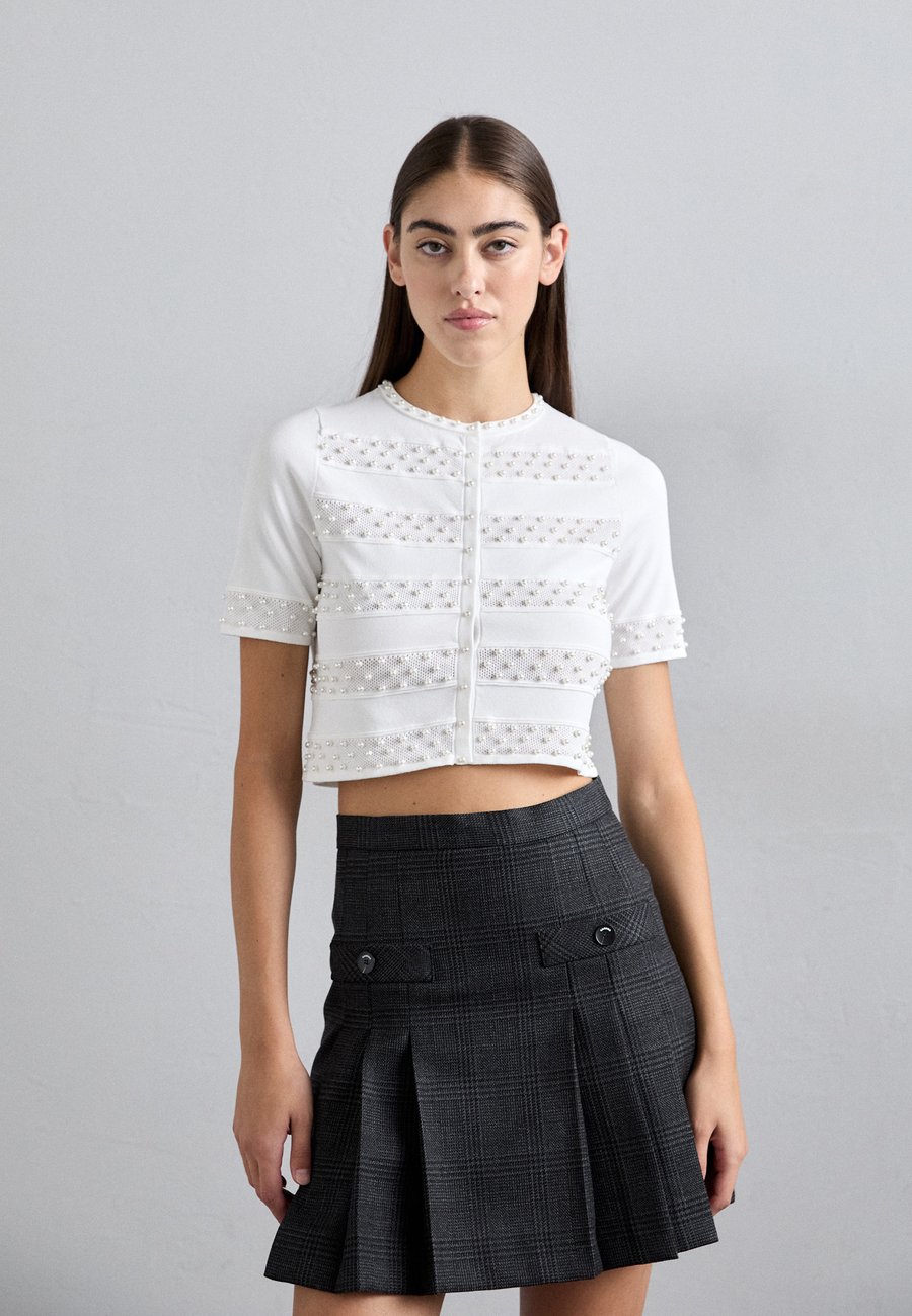 Кардиган sandro MATCH, Ecru/Off-White
Кардиган sandro MATCH, Ecru/Off-White
