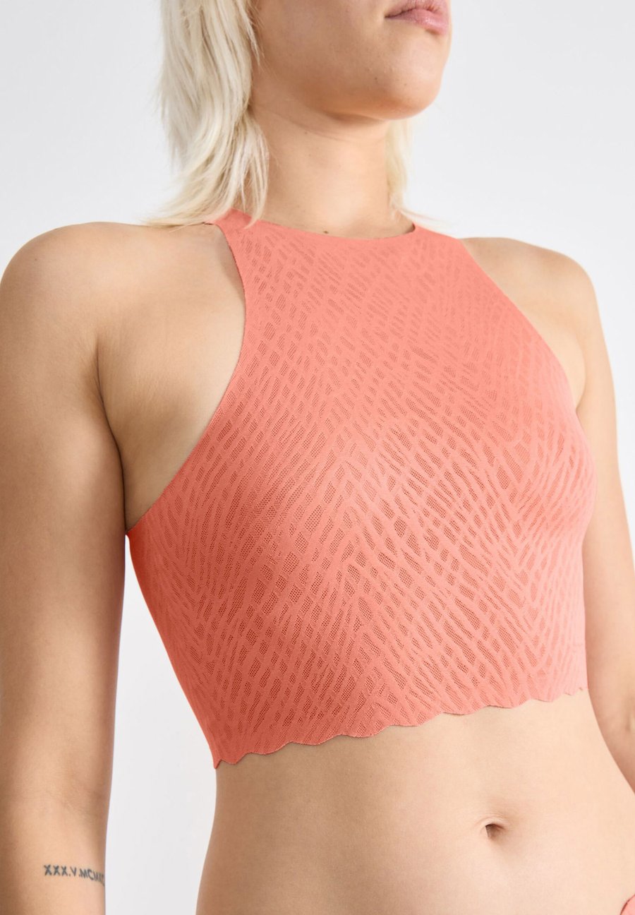 Бюстье Sloggi FEEL BLISS, Lovely Apricot/Salmon
Бюстье Sloggi FEEL BLISS, Lovely Apricot/Salmon