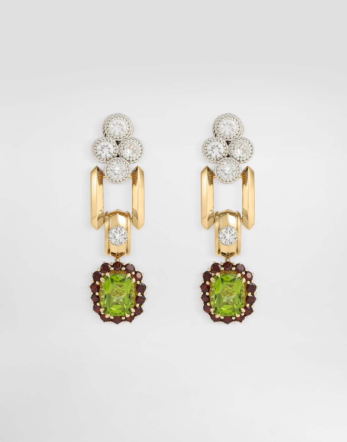 DOLCE & GABBANA Серьги Eleganza из белого и желтого золота 18 карат с перидотами, гранатами и сапфирами
DOLCE & GABBANA Серьги Eleganza из белого и желтого золота 18 карат с перидотами, гранатами и сапфирами