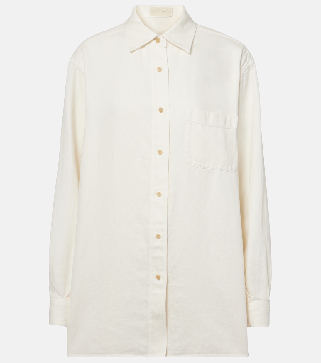 Нессон просторная льняная рубашка в стиле деним The Row, белый
Нессон просторная льняная рубашка в стиле деним The Row, белый
