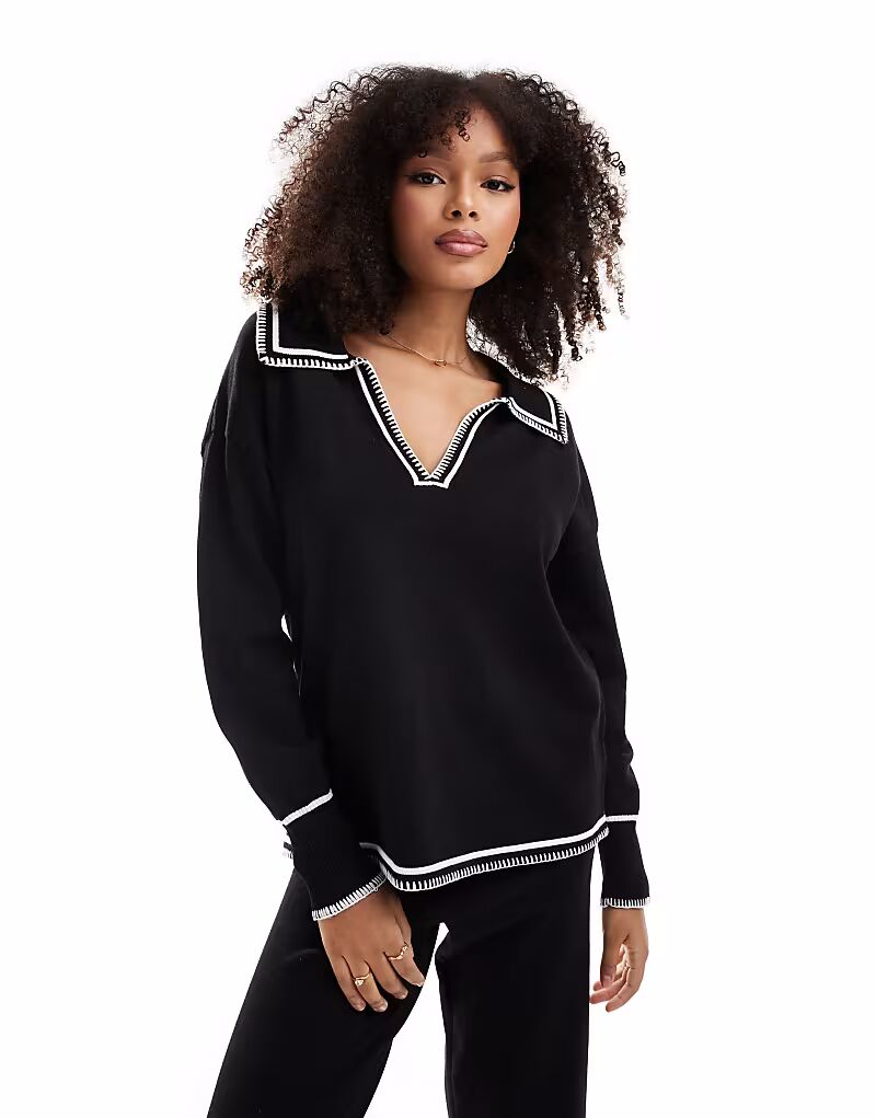 Джемпер SNDYS с трикотажным воротником черного цвета с белой строчкой
Джемпер SNDYS с трикотажным воротником черного цвета с белой строчкой