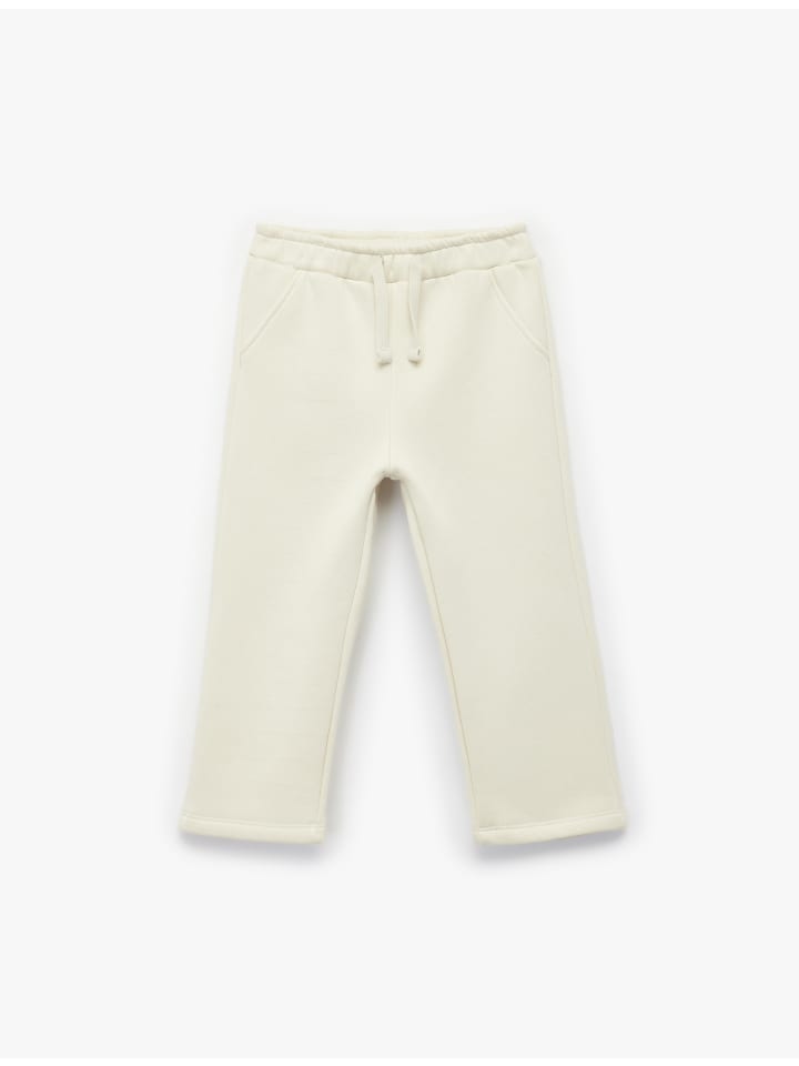 Спортивные брюки бежевого цвета KOTON
Спортивные брюки бежевого цвета KOTON