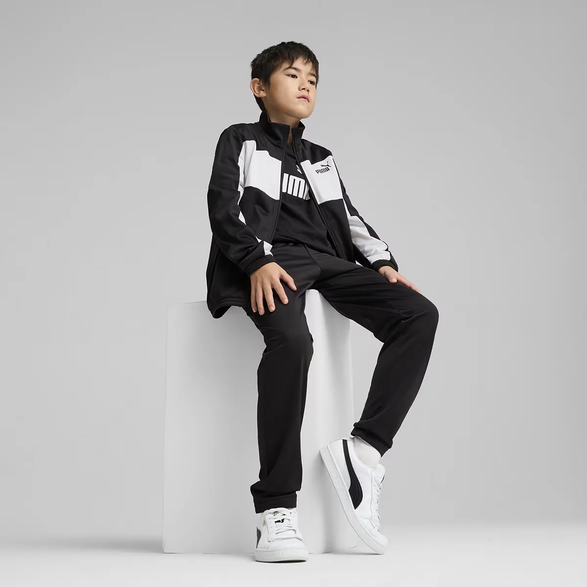 Детский спортивный костюм Puma Poly в стиле колорблок, чёрный
Детский спортивный костюм Puma Poly в стиле колорблок, чёрный