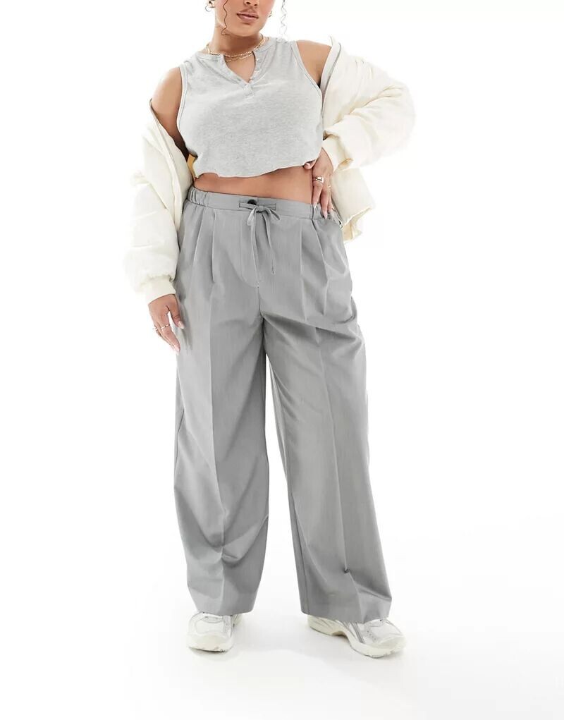 Элегантные серые брюки без застежки ASOS Curve
Элегантные серые брюки без застежки ASOS Curve