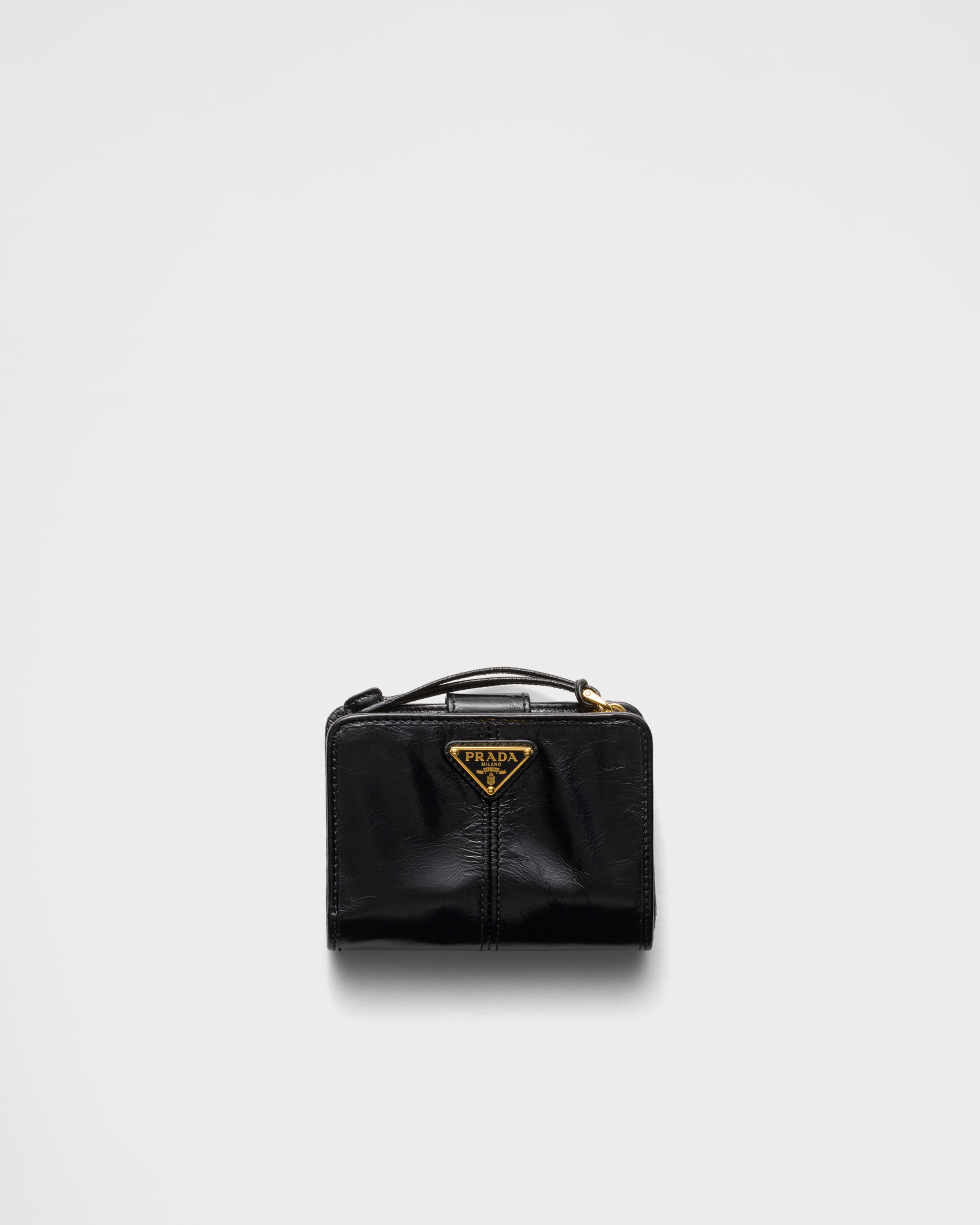 Маленький кожаный кошелек Prada, черный
Маленький кожаный кошелек Prada, черный