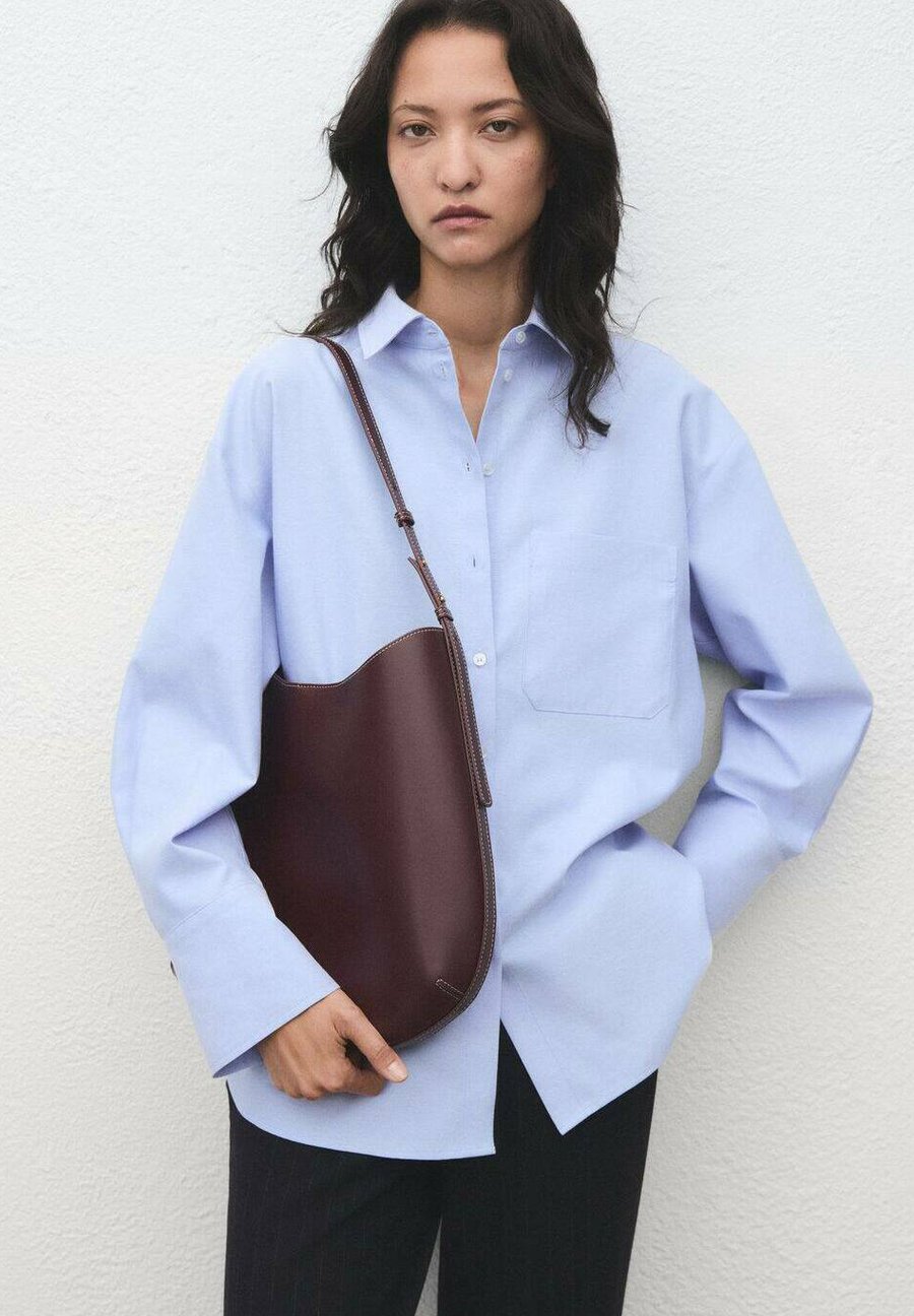 Блуза Mango Button-down blouse, Light Blue
Блуза Mango Button-down blouse, Light Blue