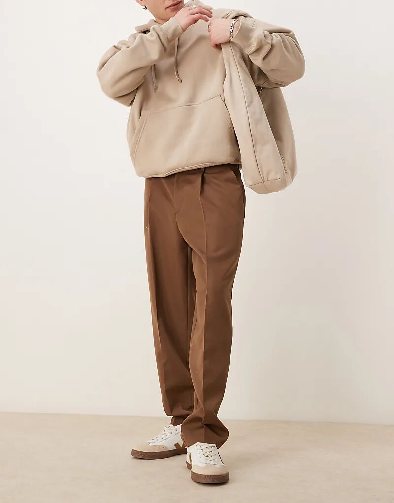 Элегантные зауженные брюки свободного кроя со складкой спереди коричневого цвета ASOS DESIGN
Элегантные зауженные брюки свободного кроя со складкой спереди коричневого цвета ASOS DESIGN