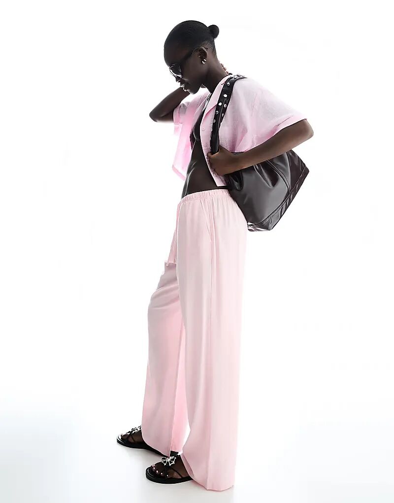 Брюки Bershka из льняной смеси с эластичным поясом розового цвета
Брюки Bershka из льняной смеси с эластичным поясом розового цвета