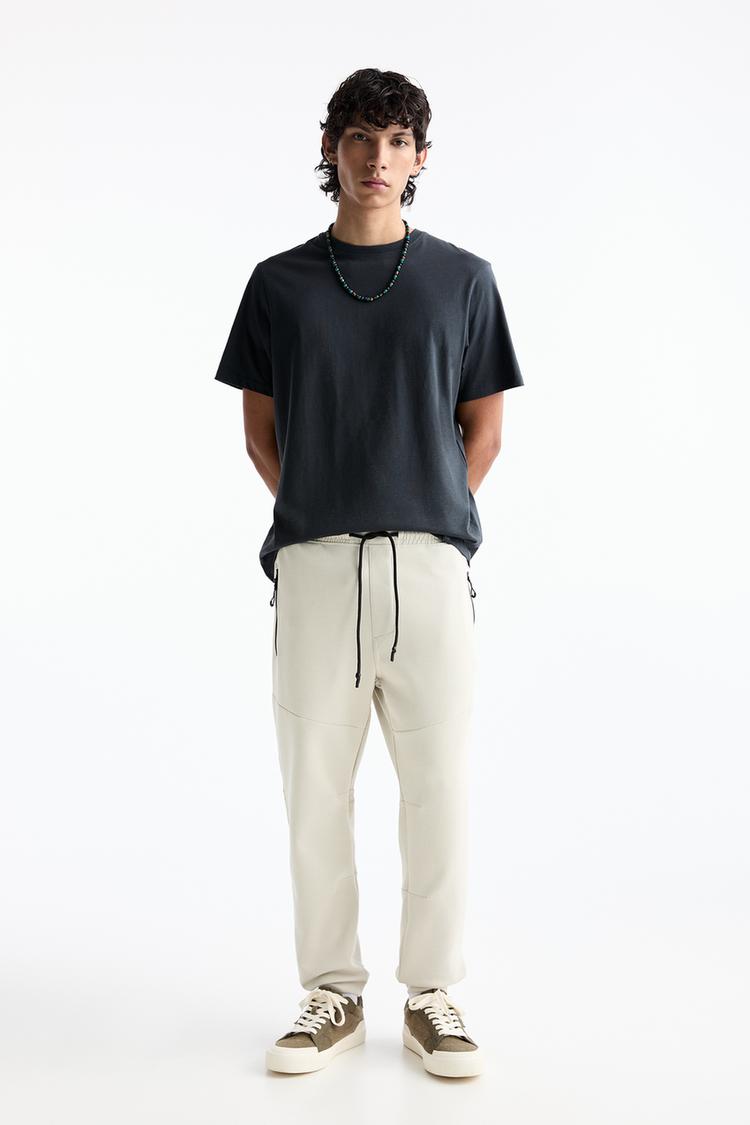 Технические спортивные штаны Pull And Bear, бежевый 
Технические спортивные штаны Pull And Bear, бежевый