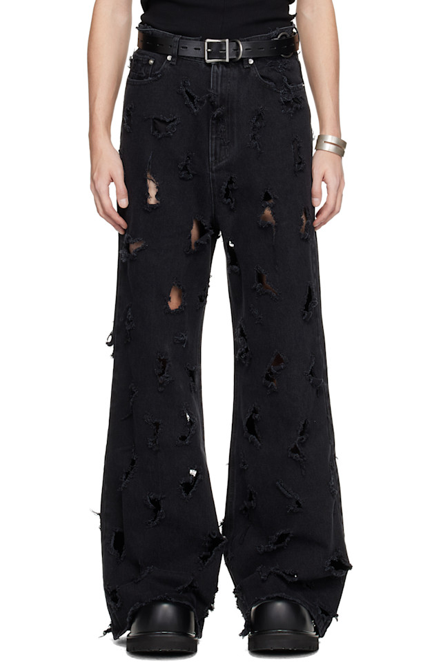 Matières Fécales Черные рваные джинсы
Matières Fécales Черные рваные джинсы