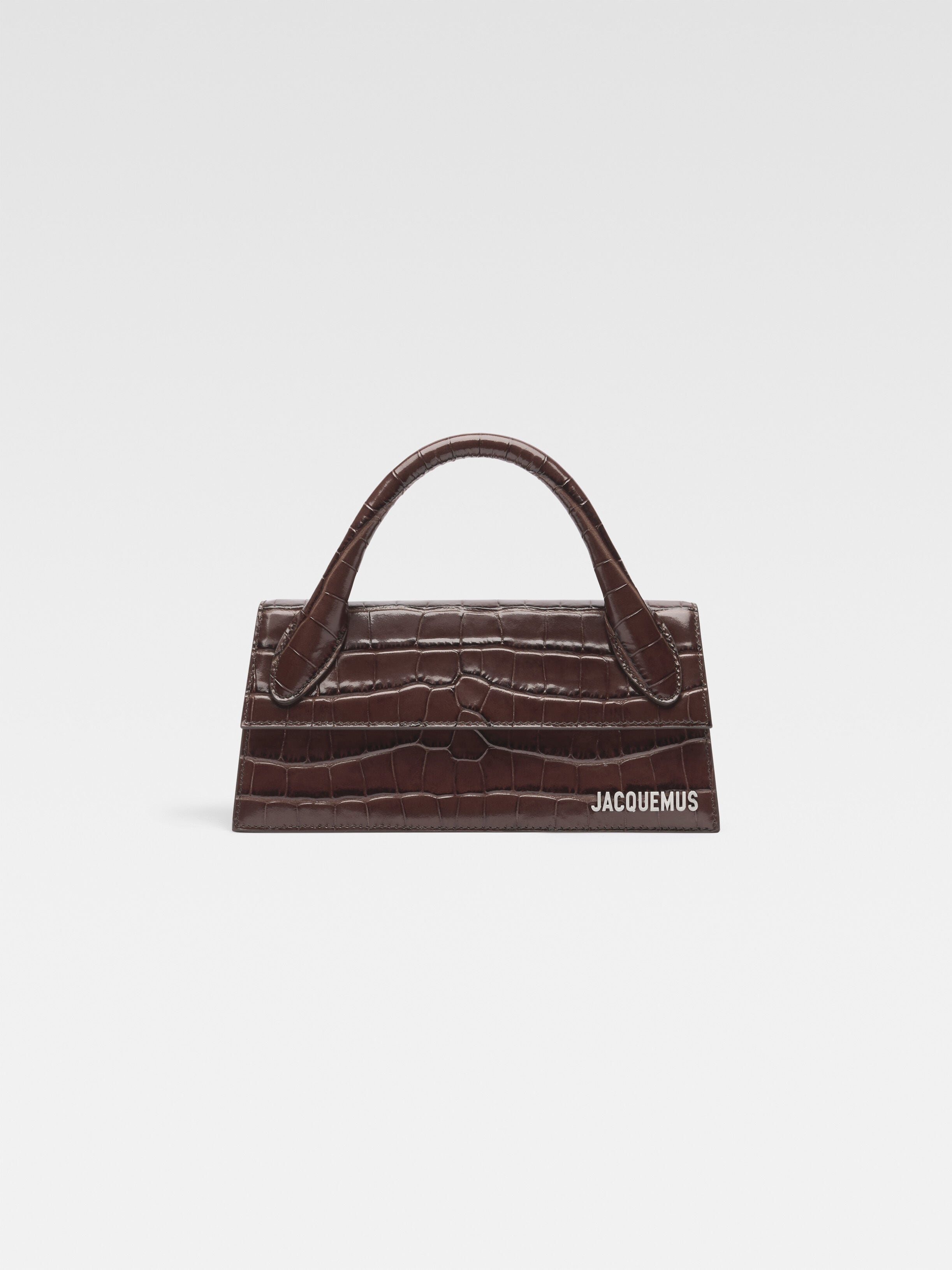 Длинная фирменная сумочка JACQUEMUS The long Chiquito, темно-коричневый
Длинная фирменная сумочка JACQUEMUS The long Chiquito, темно-коричневый