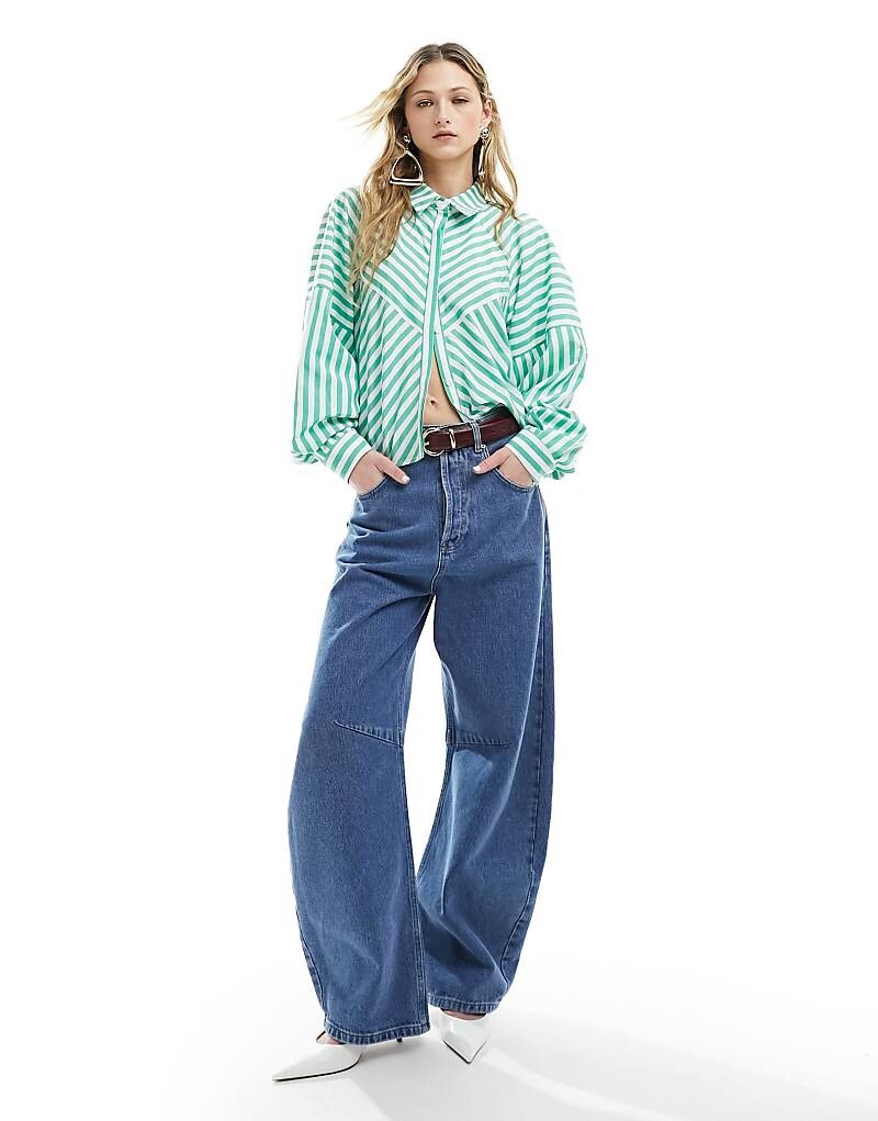 ASOS DESIGN – Блузка-рубашка в зеленую полоску со склеенными деталями и объемными плечами
ASOS DESIGN – Блузка-рубашка в зеленую полоску со склеенными деталями и объемными плечами
